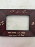 Custom engraved wood photo frame with Mr. and Mrs. and wedding date