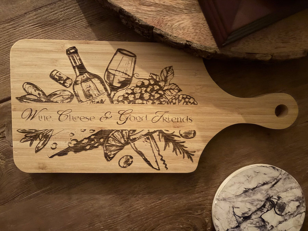 Engraved bamboo cutting board with wine, cheese and grapes design